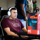Col. Peter Bonetti, 90th Missile Wing commander and Chief Master Sgt. Nicholas Taylor, 90 MW command chief, conduct a ribbon-cutting ceremony for the Fall Hall Game Capsule on F.E. Warren Air Force Base, Wyoming, June 5, 2021. The game room was tied to the Air Force Gaming League allowing Airmen to participate in person or online for our 165 Discord members. U.S. Air Force photo by Tech. Sgt. Rayshard Carter